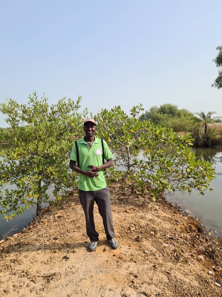Hassan Gindeh guiding guests through The Gambia
